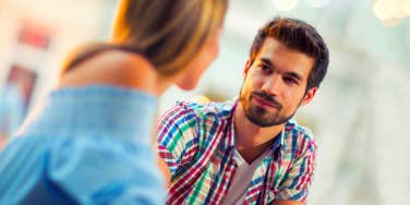 man looking at woman thinking about testing her