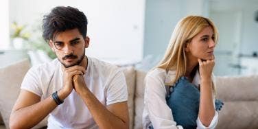 couple arguing on couch