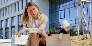 woman sitting outside after quitting job