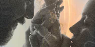 Couple holding hands together connecting