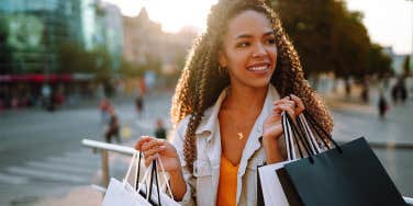 woman carrying shopping bags