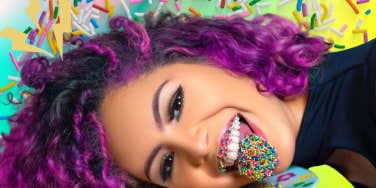 Confident woman playing with sprinkles 