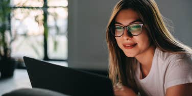 woman looking at laptop