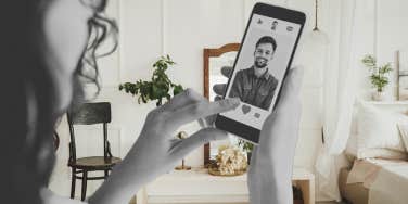 woman on dating app in her home
