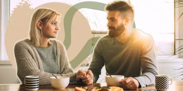 Couple having a heart to heart in the kitchen over coffee