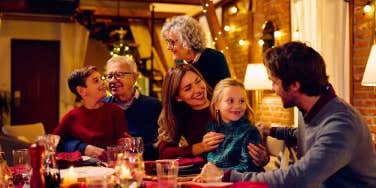 family gathered around table for holiday celebration