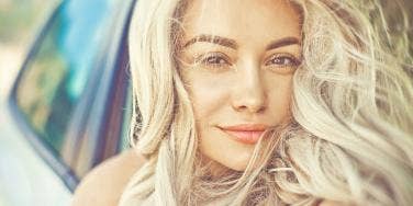 photo of woman with wavy blonde hair