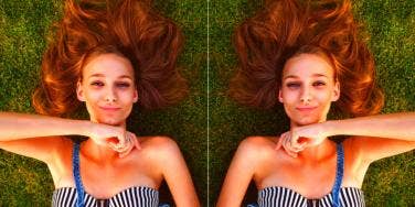 happy woman relaxing on the grass