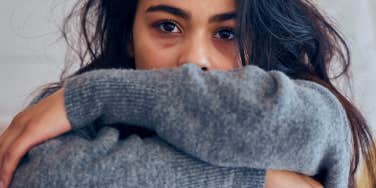 woman with anxiety looking at the camera