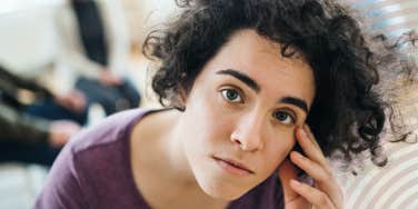 Woman at group therapy meeting