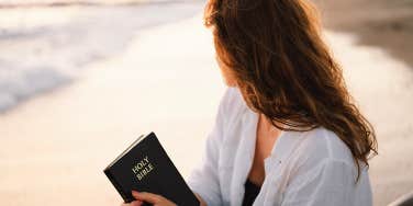 woman holding bible
