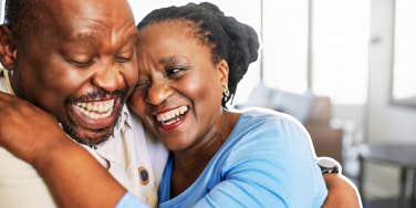 Couple touching each other laughing