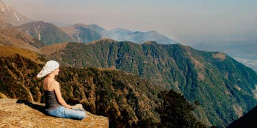 Author meditating on mountain side