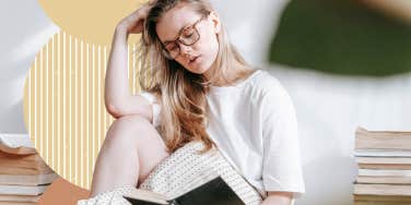 woman reading a good book in comfy clothes