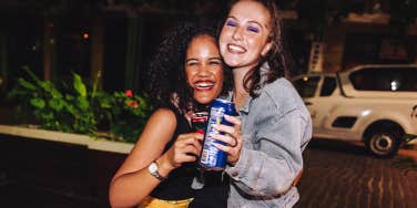 two women friends laughing