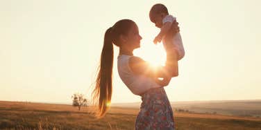 woman holding baby