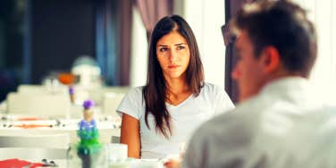 woman looking at her partner wondering why she's not attracted to him anymore