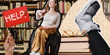 Woman studying in wheelchair, foot in boot