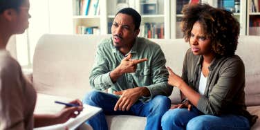 couple arguing in couples counselor's office