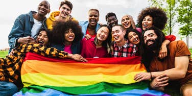 people holding pride flag