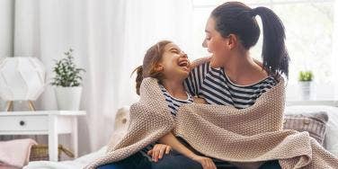 mom daughter laughing