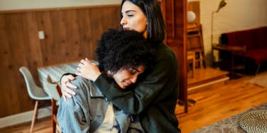 friend comforting grief