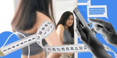 Woman looking at herself in the mirror with frown on her face