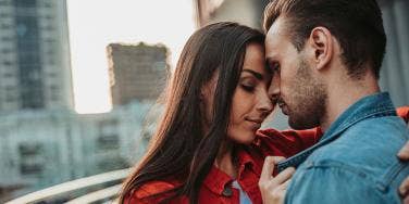 couple touching heads