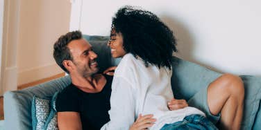 couple kissing on couch