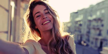 woman smiling on European street