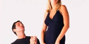 Man begging woman