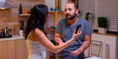 couple arguing in the kitchen