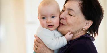 Mother-in-law holding grandson