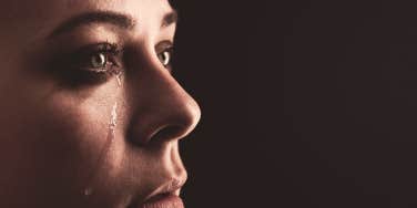 woman crying closeup photo