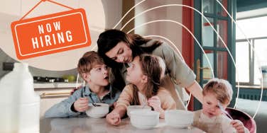Mother with her children and hiring sign