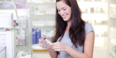 woman trying perfume