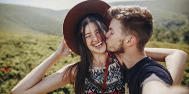 couple smiling kissing