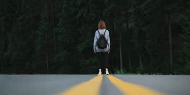 woman walking away