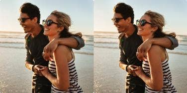 man and woman hugging and walking on beach