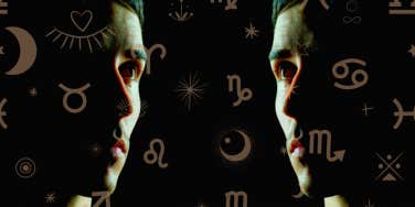 man's facial silhouette and zodiac sign glyphs