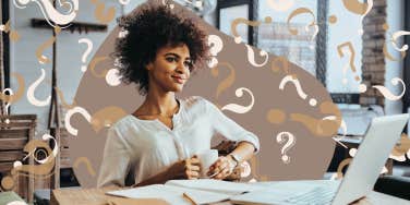 Woman sitting at desk contemplating 