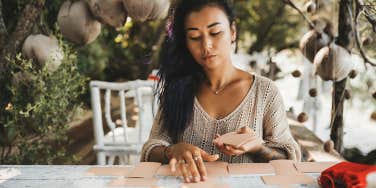 woman reading tarot cards