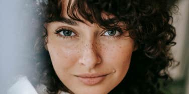 charming attractive woman with freckles