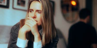 woman wondering how to handle her grieving husband's trauma
