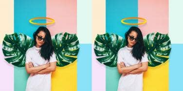 woman with leafy angel wings and halo