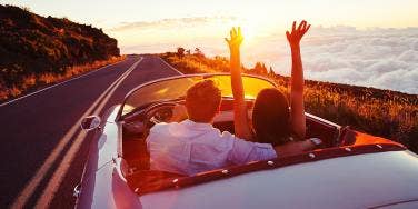 couple in car at sunset