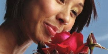 woman smell rose