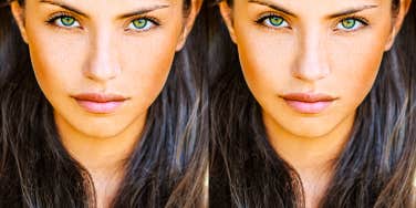 woman with bright green eyes looking at the camera