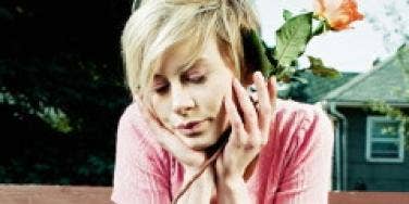 sad woman with rose