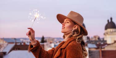 woman holding sparkler